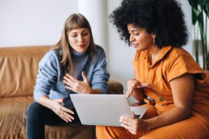 Women talking to each other about how many egg freezing cycles they should do