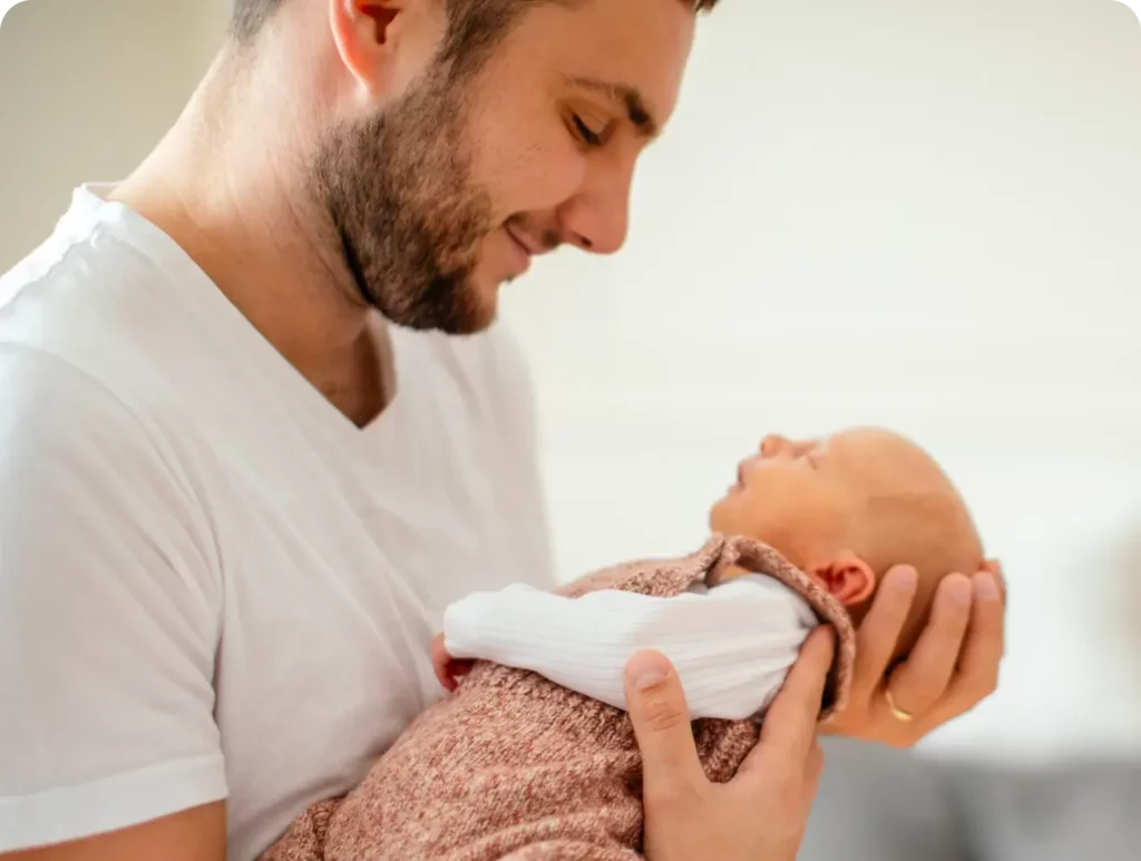 male father holding his son in his hands