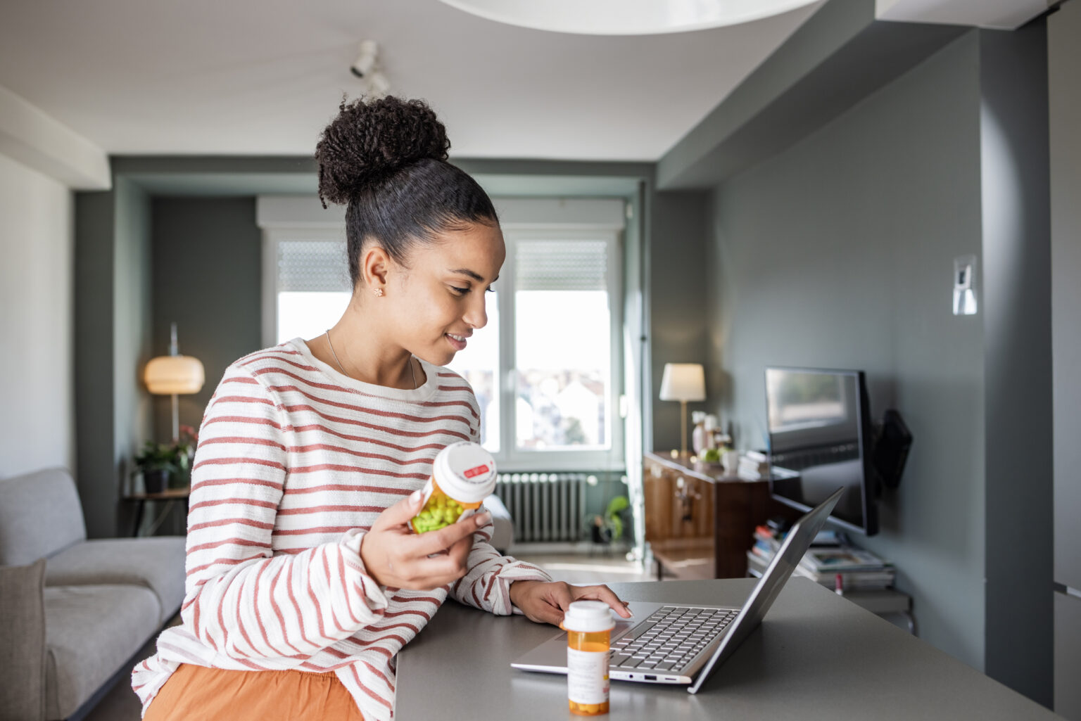 Young woman searching online for more information about her medical condition